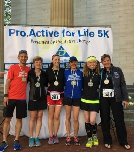 Tim, Ruth, Amber, Becca, Me, and Linda after the Pro.Active For Life 5K...all sporting our bling!