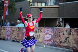 Me crossing the finish line of the Urban Bourbon Half Marathon - Louisville, KY