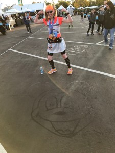 Me after finishing the Disneyland Star Wars Light Side Half Marathon and completing the Rebel Challenge
